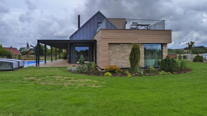 Interesting wooden house with two teraces